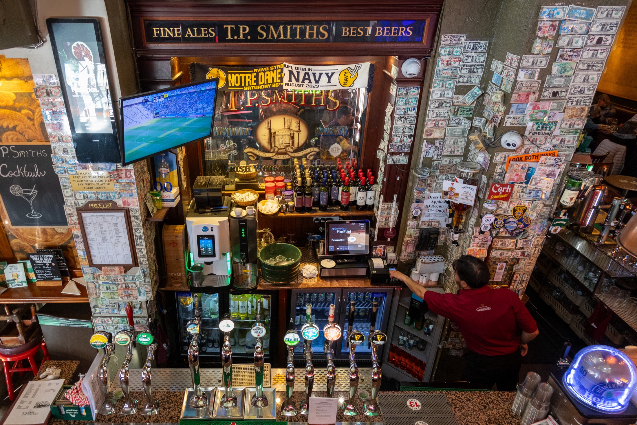 Warm, wood-paneled interior of an Irish pub